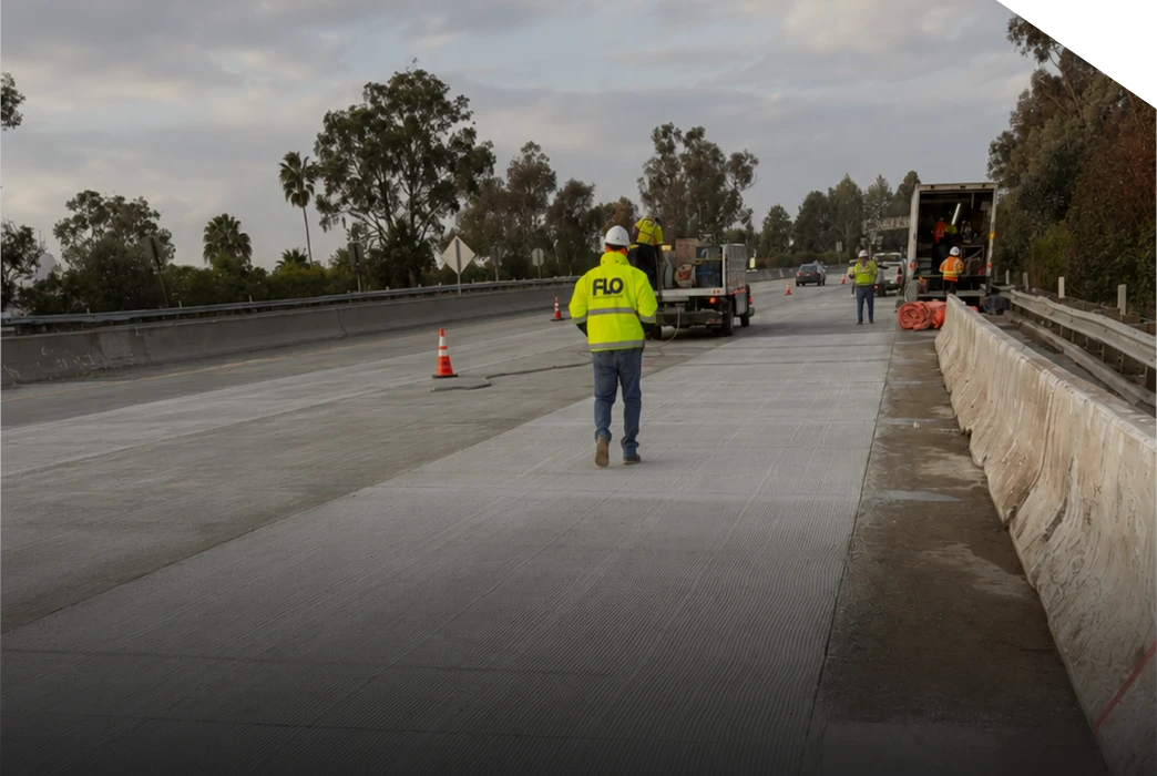 Road crew restoring drainage and pavement on I-10 at Robertson Boulevard